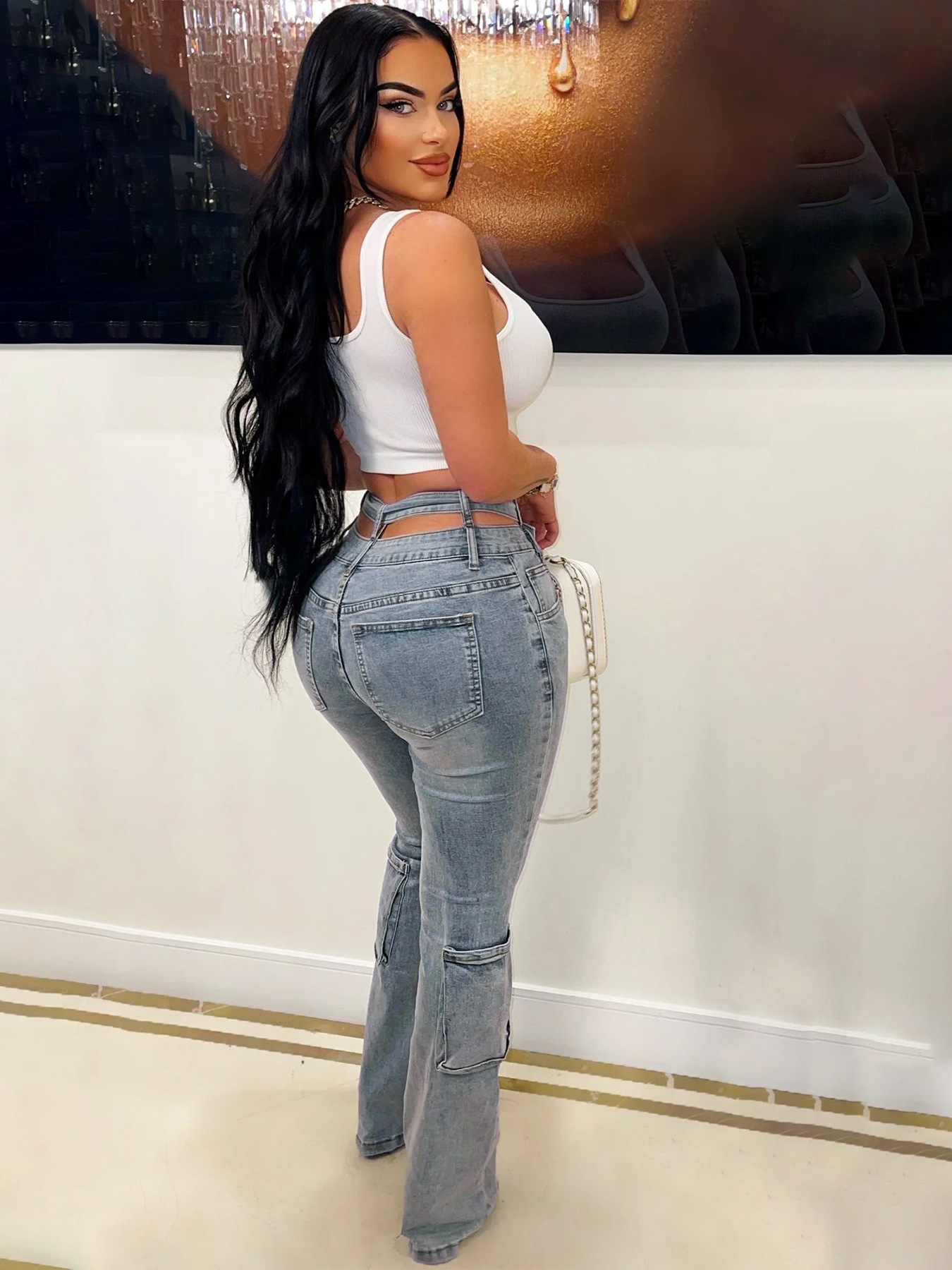 The Black Cross over Jeans